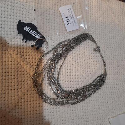 Sale Photo Thumbnail #601: necklace and key ring