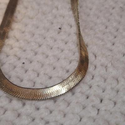 Sale Photo Thumbnail #611: one of them may have a marking but neither are actually gold.