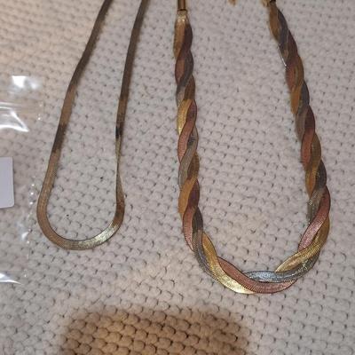 Sale Photo Thumbnail #608: one of them may have a marking but neither are actually gold.