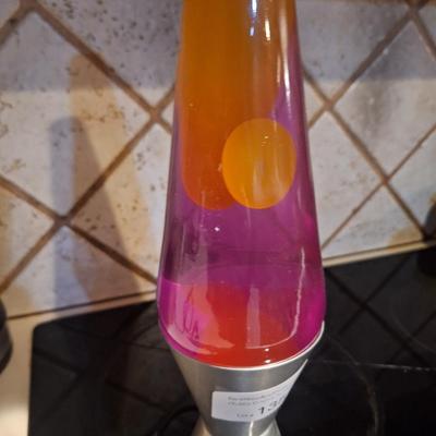 Sale Photo Thumbnail #801: we put batteries in it and pushed on the nose, the eyes react, it makes sounds and the tail moves a little.  We aren't sure how to make it do things so the testing was very limited.  It takes 4 AA batteries