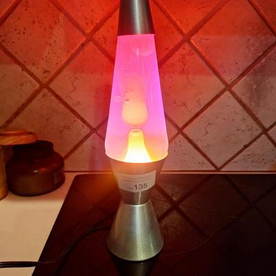 Sale Photo Thumbnail #800: we put batteries in it and pushed on the nose, the eyes react, it makes sounds and the tail moves a little.  We aren't sure how to make it do things so the testing was very limited.  It takes 4 AA batteries