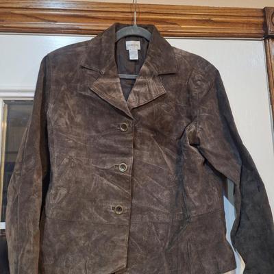 Sale Photo Thumbnail #841: this is size 1 in chico's which typically fits like a 1x.  It is leather.