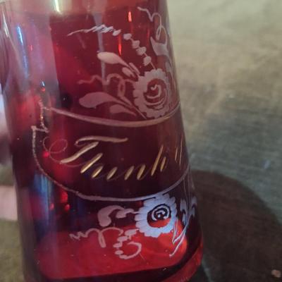 Sale Photo Thumbnail #881: small cut to clear red crystal glass that says Think of me