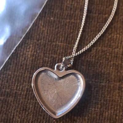 Sale Photo Thumbnail #892: heart shaped pendant on silver chain