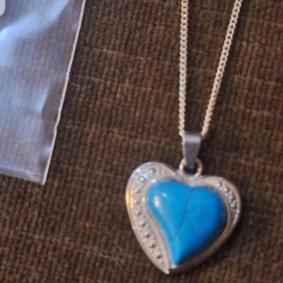 Sale Photo Thumbnail #893: heart shaped pendant on silver chain