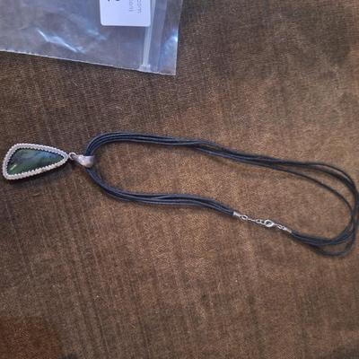 Sale Photo Thumbnail #911: Necklace with silver and green stone pendant