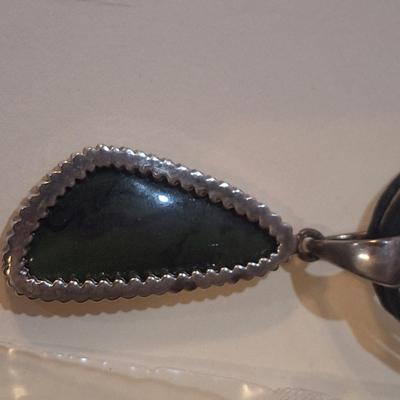 Sale Photo Thumbnail #910: Necklace with silver and green stone pendant