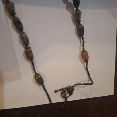 Sale Photo Thumbnail #942: type of stone is unknown, it is actual stone, lots of green and brown coloring