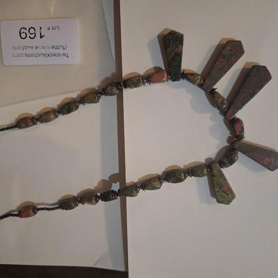 Sale Photo Thumbnail #940: type of stone is unknown, it is actual stone, lots of green and brown coloring