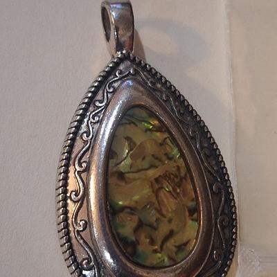 Sale Photo Thumbnail #989: large pendant- abalone or similar in silver tone tear drop