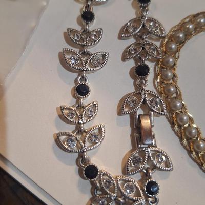 Sale Photo Thumbnail #1006: the gold tone one is Napier