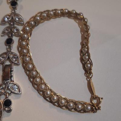 Sale Photo Thumbnail #1007: the gold tone one is Napier