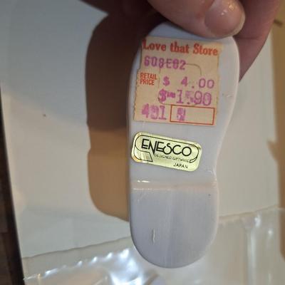 Sale Photo Thumbnail #1053: Enesco ceramic shoe with candle inside