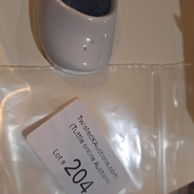 Sale Photo Thumbnail #1052: Enesco ceramic shoe with candle inside