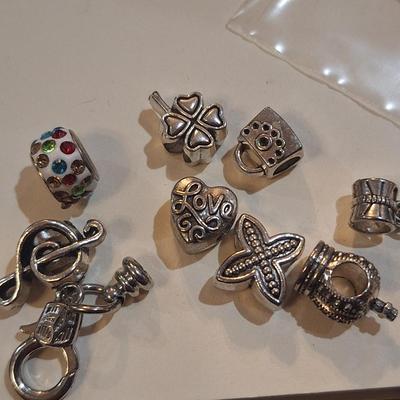 Sale Photo Thumbnail #1064: these are the mostly the kind where the bracelet goes through them like a bead.