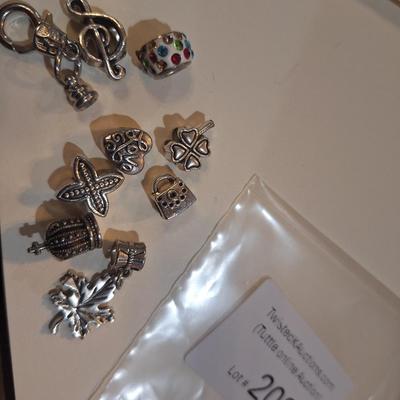 Sale Photo Thumbnail #1062: these are the mostly the kind where the bracelet goes through them like a bead.