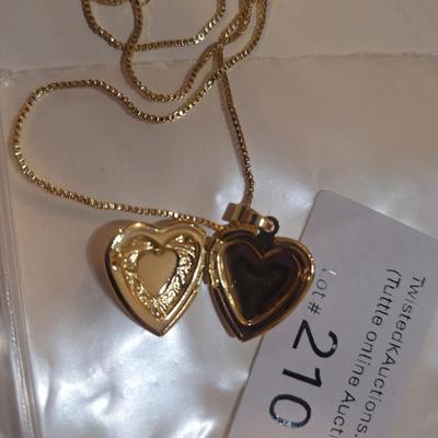Sale Photo Thumbnail #1071: gold tone heart locket on chain