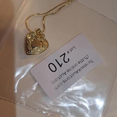 Sale Photo Thumbnail #1070: gold tone heart locket on chain