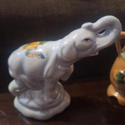 Sale Photo Thumbnail #1128: Elephant and small vase