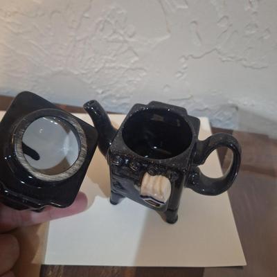 Sale Photo Thumbnail #1151: looks like pot belly stove