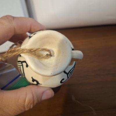 Sale Photo Thumbnail #1321: Small ornament of folk art vase