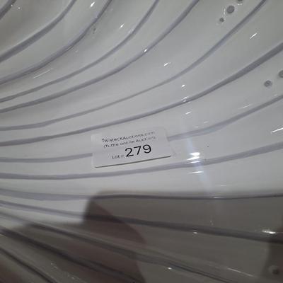 Sale Photo Thumbnail #1423: according to AI this is made in Portugal but we don't see that marked on it anywhere.  It does have the look of clay pottery that has been covered in white.