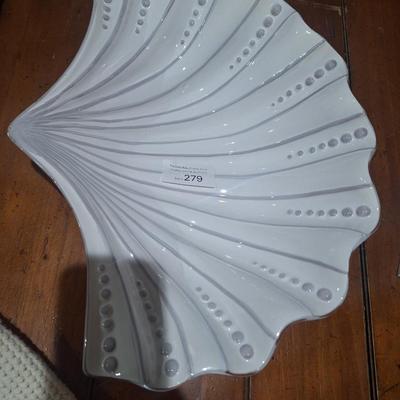 Sale Photo Thumbnail #1421: according to AI this is made in Portugal but we don't see that marked on it anywhere.  It does have the look of clay pottery that has been covered in white.