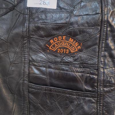 Sale Photo Thumbnail #1479: this is a personalized jacket.  It also has some damage, notice that the top buffalo snap is missing the cover, the lace on the sides has damage.  There may be other damage, please review the photos yourself for condition. This is leather.