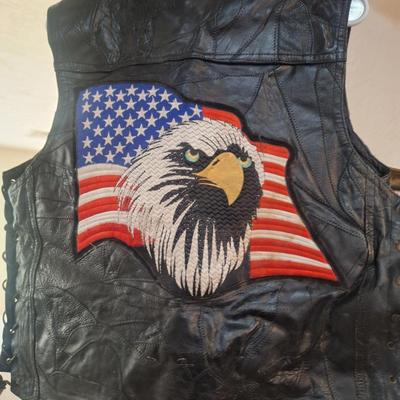 Sale Photo Thumbnail #1486: this is a personalized jacket.  It also has some damage, notice that the top buffalo snap is missing the cover, the lace on the sides has damage.  There may be other damage, please review the photos yourself for condition. This is leather.