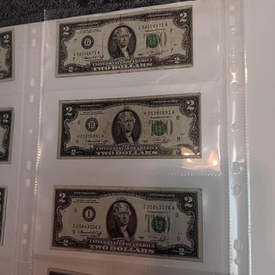 TWELVE $2 DOLLAR BILLS