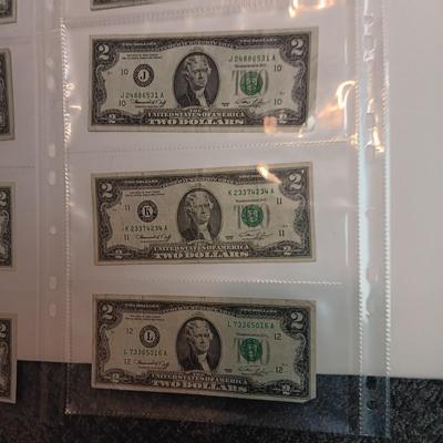 TWELVE $2 DOLLAR BILLS