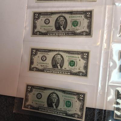 TWELVE $2 DOLLAR BILLS