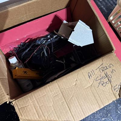 Lot 27: Garage / Rolltop table, train stuff & Some holiday selection