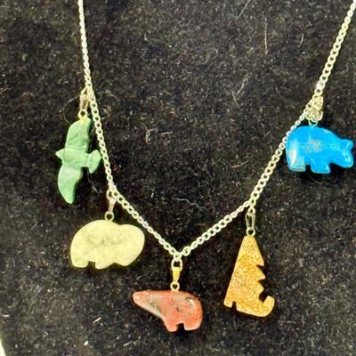 Sale Photo Thumbnail #186: In good previously owned condition. Stone animals depicted are Eagle, Wolf, Polar Bear, White Bison, and Grizzly Bear.