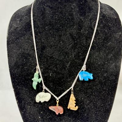 Sale Photo Thumbnail #187: In good previously owned condition. Stone animals depicted are Eagle, Wolf, Polar Bear, White Bison, and Grizzly Bear.