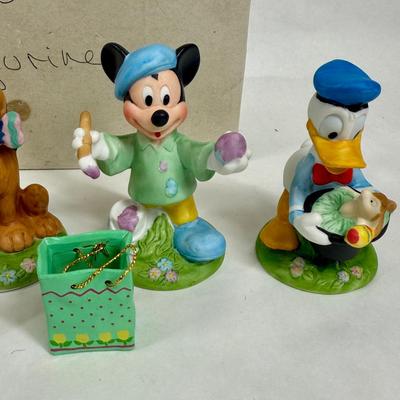 Sale Photo Thumbnail #248: Set of Disney Easter figurines. The figurines are Mickey Mouse, Minnie Mouse, Donald Duck, Daisy Duck, and Pluto