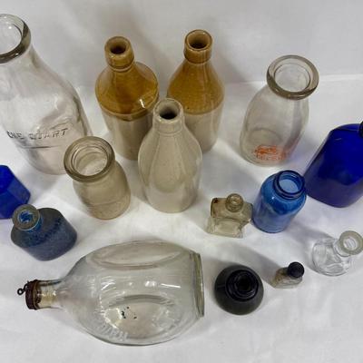 Sale Photo Thumbnail #299: Blue, smoky and clear glass and milk bottle.  See photos for what's included.