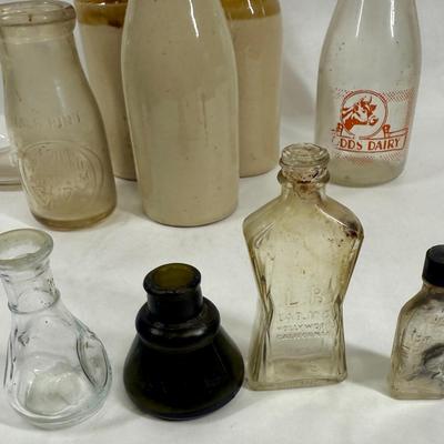 Sale Photo Thumbnail #290: Blue, smoky and clear glass and milk bottle.  See photos for what's included.