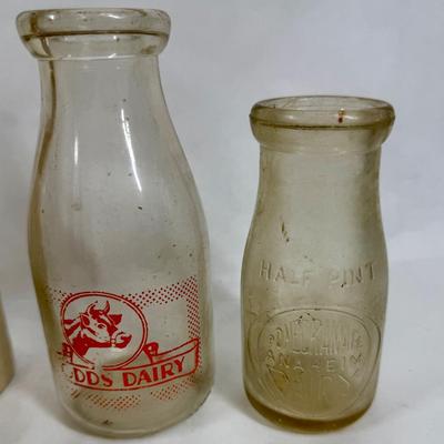 Sale Photo Thumbnail #287: Blue, smoky and clear glass and milk bottle.  See photos for what's included.