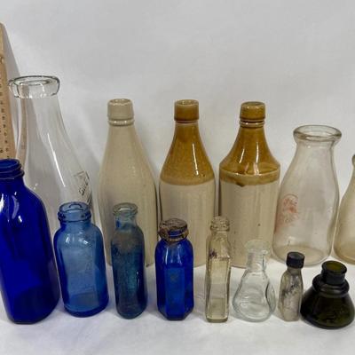 Sale Photo Thumbnail #281: Blue, smoky and clear glass and milk bottle.  See photos for what's included.