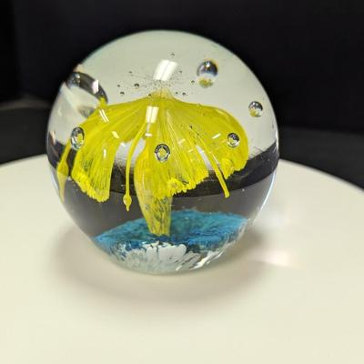 Paperweight Is Hand-Blown & Features A Yellow Flower Design With A Blue Base & Controlled Bubbles