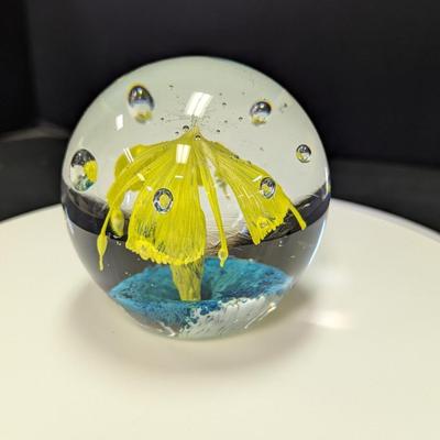 Paperweight Is Hand-Blown & Features A Yellow Flower Design With A Blue Base & Controlled Bubbles