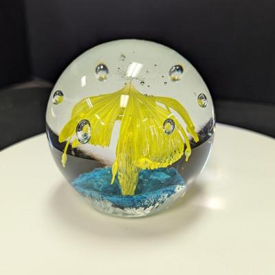 Paperweight Is Hand-Blown & Features A Yellow Flower Design With A Blue Base & Controlled Bubbles