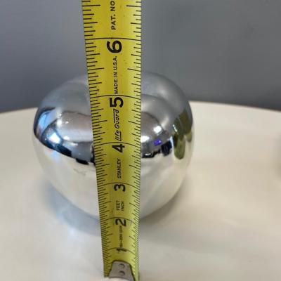 Small vases and silver apple decor