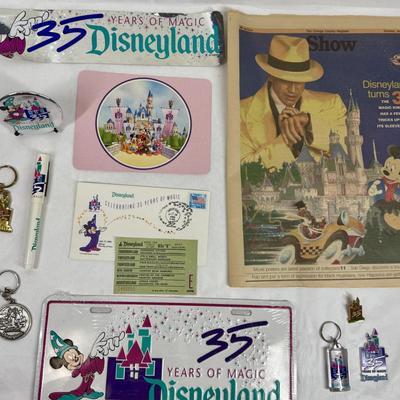 Sale Photo Thumbnail #150: Collectible lot includes newspaper handout, pin-on button, license plate, key fobs, pen, number sticker, and more. See photos for what's included.