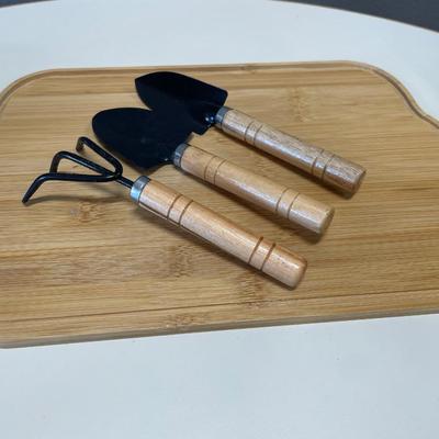 Wood base with mini gardening tools