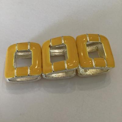 Silver tone yellow enamel stretch bracelet