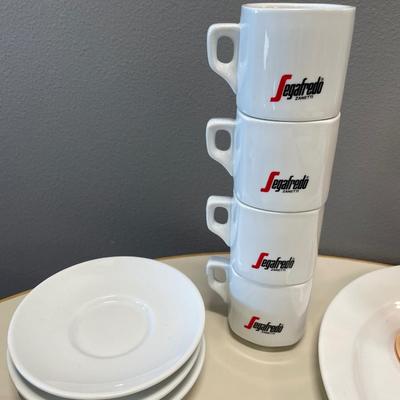 Seared stacking cups with wine glass, plate and saucers