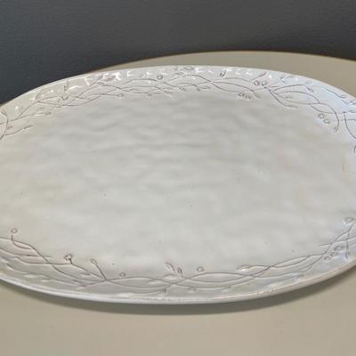 Oval serving plate with candle