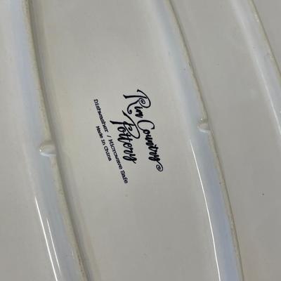 Oval serving plate with candle